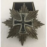 A German 1871 Grand Star Iron cross with screwback.