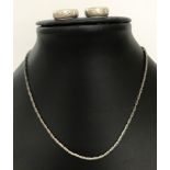 15 inch silver collar style chain.