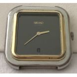 Square cased Seiko automatic watch head with black dial.