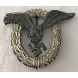 A WWII pattern German Pilot Badge.