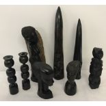 A collection of African and ethnic wood carvings.
