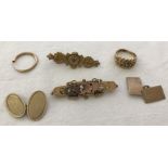 A quantity of 9ct and 18ct scrap gold jewellery.