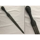 A bronze handled short sword with inlay detail to blade.