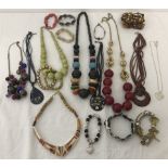 A quantity of costume jewellery to include bracelets and statement necklaces.