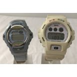 2 vintage G-Shock watches on original straps.
