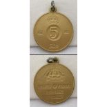 A 1954 5 Öre gilt bronze Gustav VI Adolf of Sweden coin. Bale added to top.