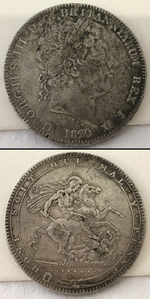 An 1820 George III silver crown coin.