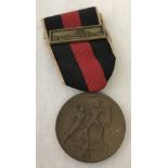 A German WWII pattern Czech occupation medal with Prague bar.