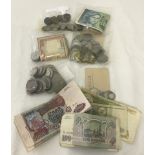 A collection of World & British coins and banknotes.