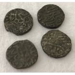 4 unidentified bronze coins.