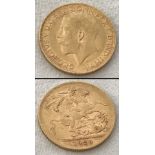 A 1925 George V gold sovereign. Pretoria (South Africa) mint.