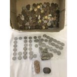 A box of assorted British coins.