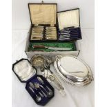 A box of assorted boxed cutlery sets and silver plated cutlery items.