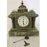 A Dent, London heavy Onyx mantel clock with pendulum and key.