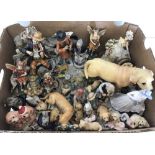 A box of assorted ceramic and resin figurines to include Cherished Teddies & Regency Fine Arts.