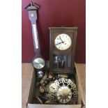 A box of mantle clocks, a wall clock and a barometer.