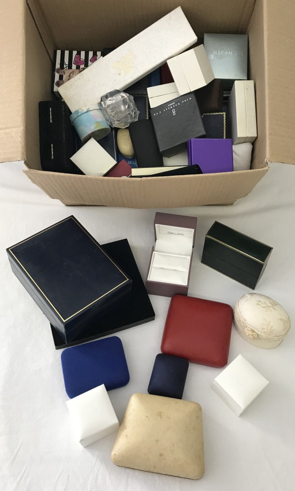 A box of empty jewellery boxes to include boxes for rings, bracelets and watches.