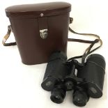 A pair of vintage leather cased Carl Zeiss Jena binoculars.