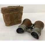 A pair of late 19th century French Verres leather bound and cased binoculars/opera glasses.
