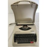 A boxed vintage Silver Reed typewriter.