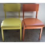 2 vintage school chairs painted orange and yellow.