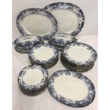 Antique Wedgwood part dinner service with flo-blue design.