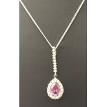 A 925 silver pendant set with amethyst and clear stones on a 18 inch silver chain.