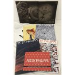 A collection of 8 Patek Philippe catalogues and magazines.