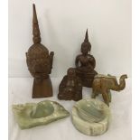 3 oriental wood carvings.