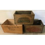 3 wooden advertising crates.