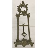A small vintage ornate brass French Rococo style Easel / display stand.