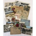 A collection of vintage postcards and mixed ephemera.