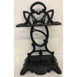 A reproduction cast iron umbrella/stick stand with Art Nouveau style decoration.