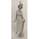 Retired Lladro ceramic figurine " Talk of the Town" # 5788.