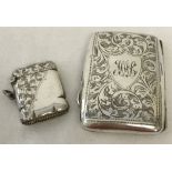 A silver vesta case with engraving detail to half of the case. Hallmarked Birmingham 1911.