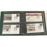 A green folder containing a quantity of 1980/1990's Australian first day covers.