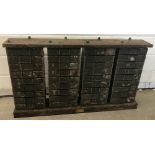 A set of vintage industrial swivel engineers drawers.