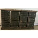 A set of vintage industrial swivel engineers drawers.