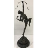 Art Deco style bronze of Diana the Huntress by Pierre Le Faguays on a circular black marble base.