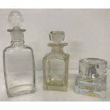 3 vintage clear glass perfume bottles.