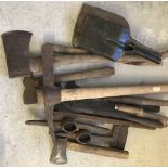 A quantity of vintage wooden handled axes, slashers and pick axes.