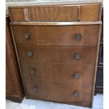 A vintage bow fronted 5 drawer chest of drawers with scalloped top drawer.