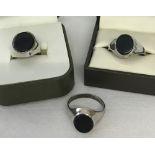 3 silver gents signet rings set with black onyx.