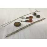 A collection of silver, amber & white metal jewellery.