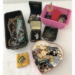 4 tubs of vintage costume jewellery, necklaces, earrings and other items.