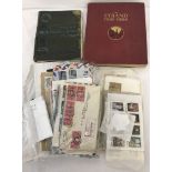 2 vintage stamp albums. Stanley Gibbons and The Strand both containing world stamps.
