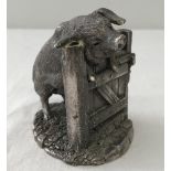 A hallmarked silver Country Artists pig at a gate figure.