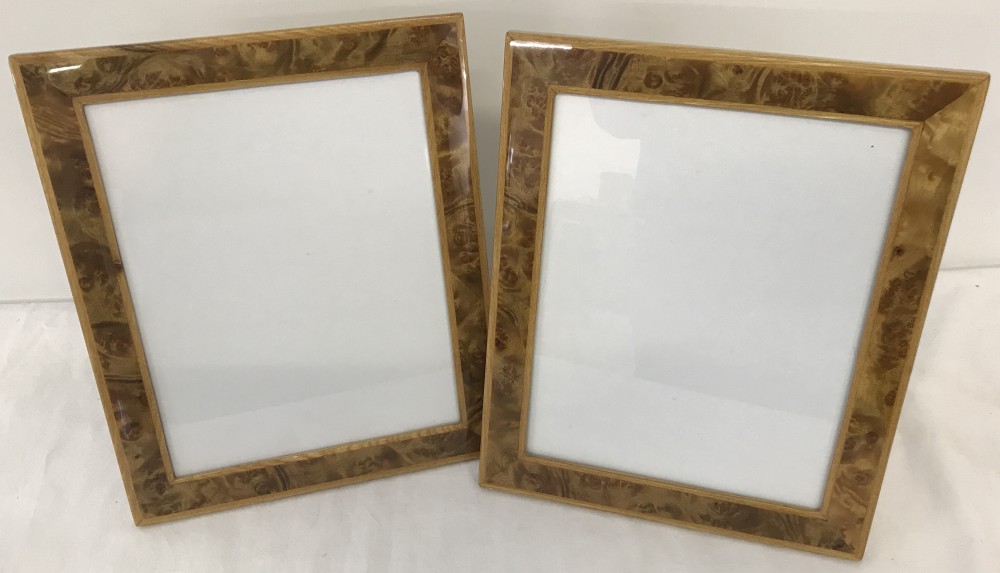 A pair of brand new boxed maple wood picture frames by Walwood.
