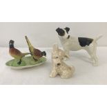 A small collection of ceramic animal figures.
