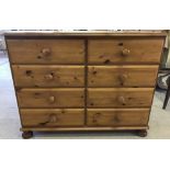 A modern pine solid wood 8 drawer bedroom chest.